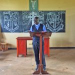 Reverend Modicum Okello speaking