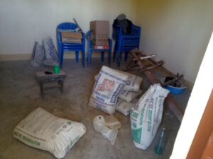 Bishops house - empty internal room with bags of cement on the floor